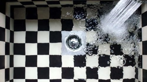 The Best Shower Tile Cleaners: Keeping Your Bathroom Tiles Extra Clean 1 black and white shower tile