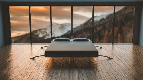 bed with a mountain background